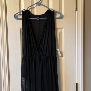 NWT body suit with sheer overlay never been worn